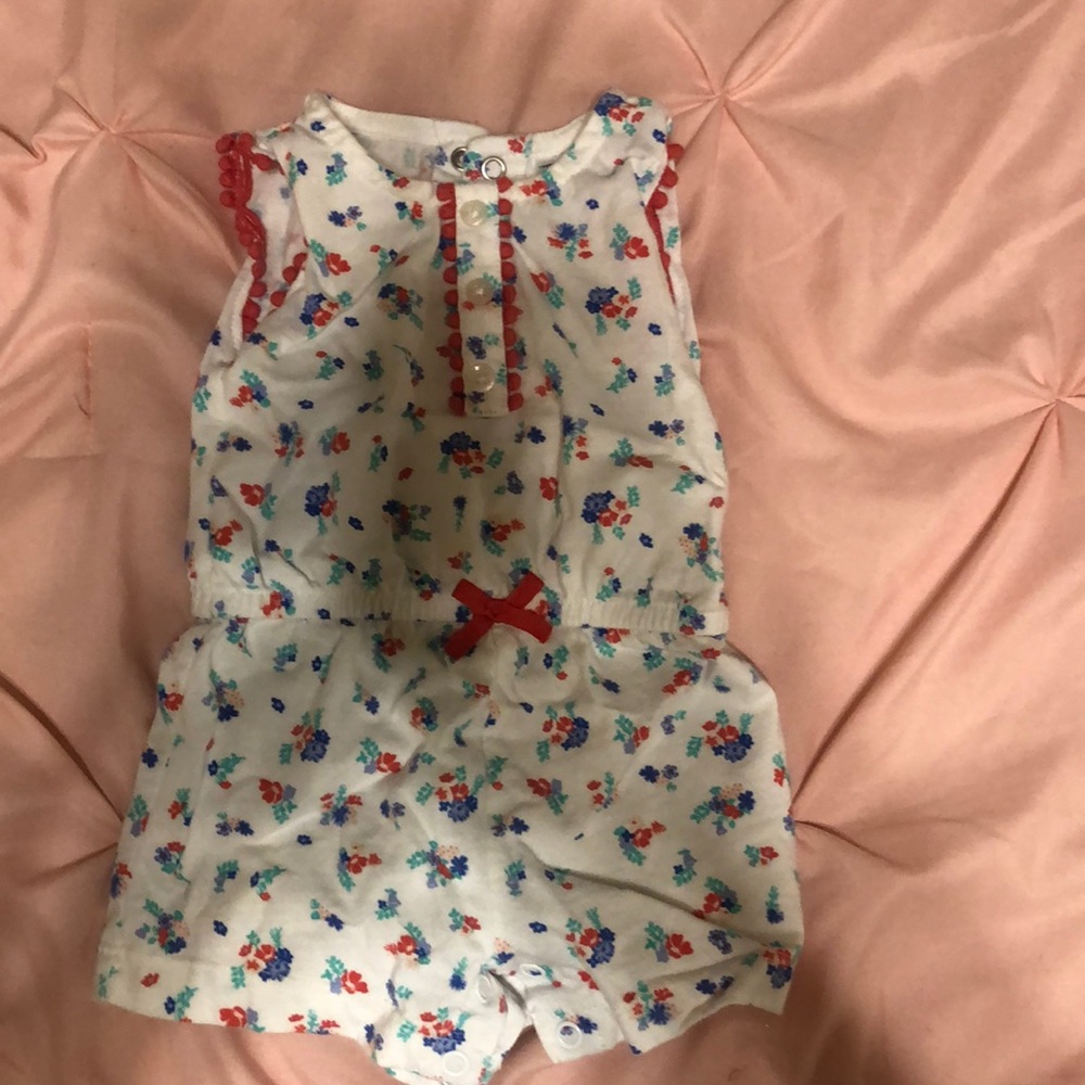 White and floral baby girl romper
